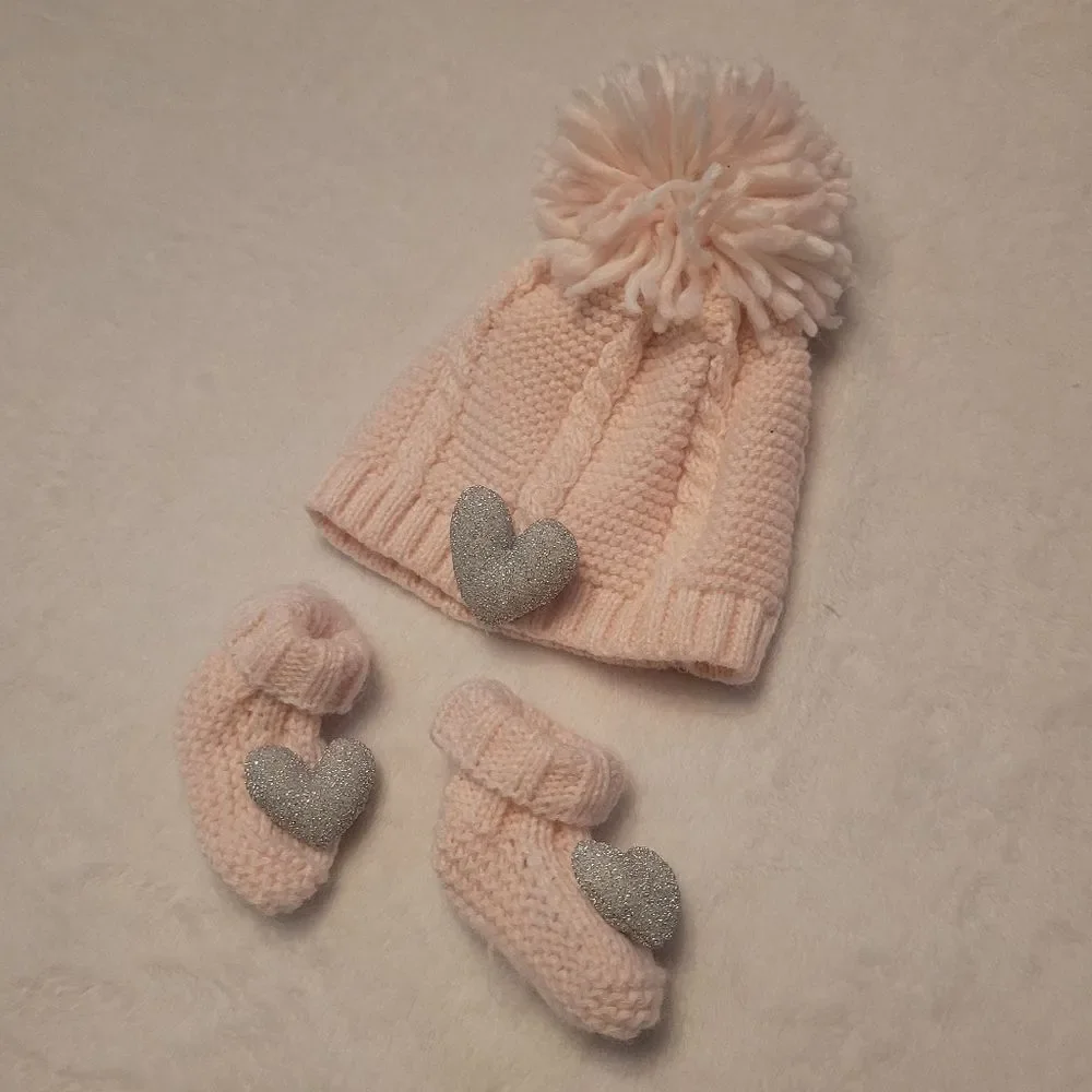 Pink knitted hat and booties silver hearts